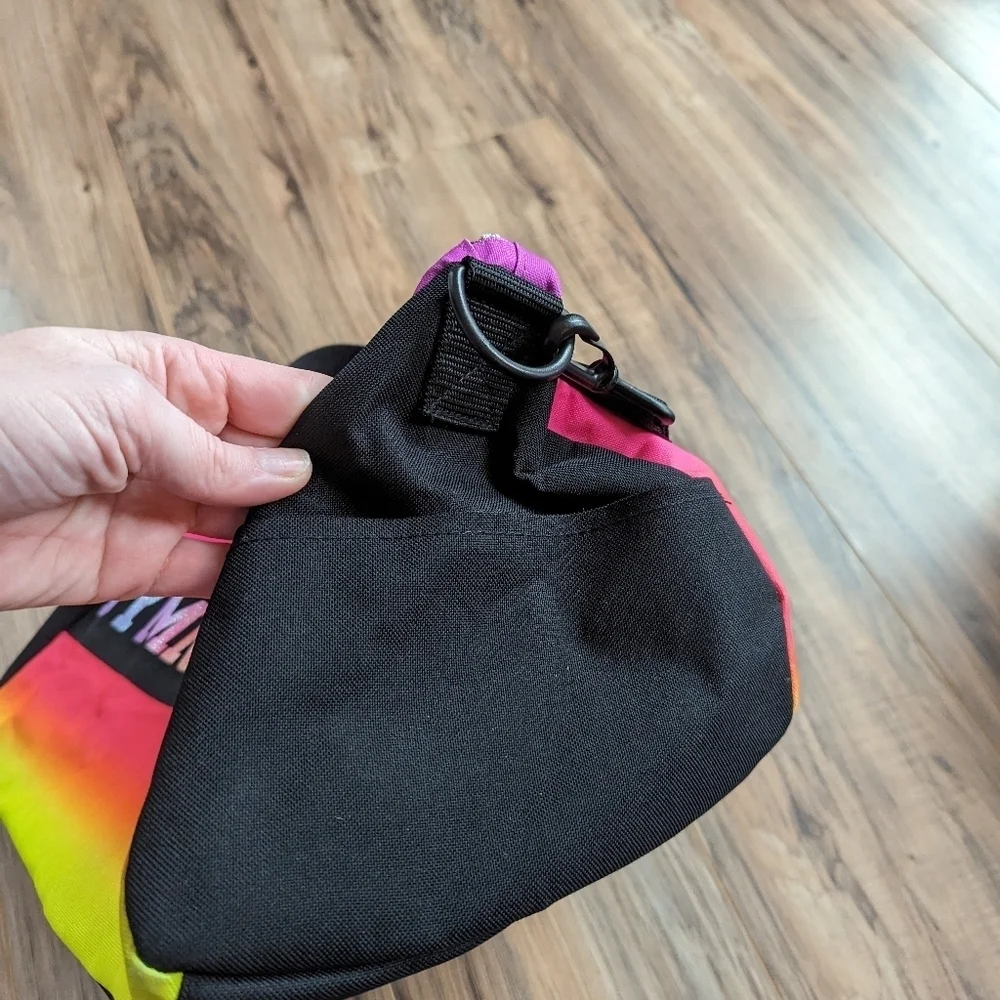 Justice duffle bag. Youth neon colored duffle bag. Justice brand bag.